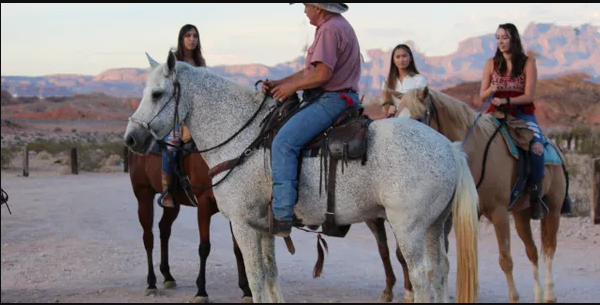 Group horseback riders in Nevada desert