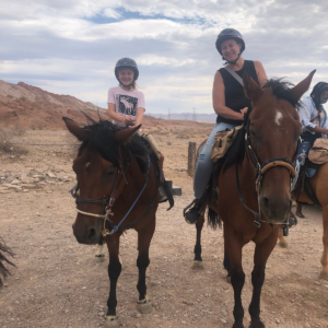Riders on rocky ridge Nevada desert